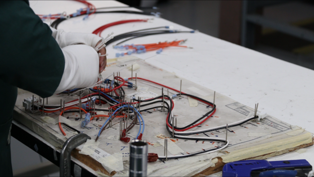 Close up view of wire harness assembly on a cable board.